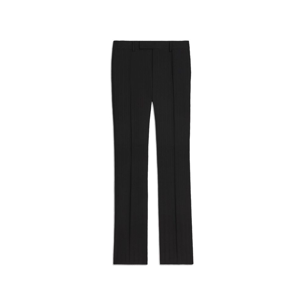 Pantalon évasé en laine noire de Celine, coupe fluide et élégante, visible en détail sur cette image.