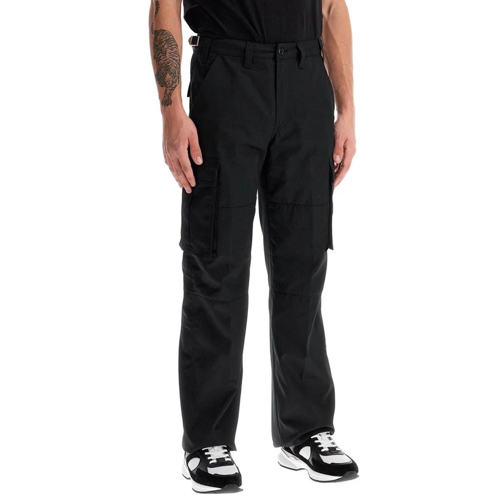 Pantalon cargo noir en coton de la marque Celine, avec poches et coupe décontractée, vue en gros plan.