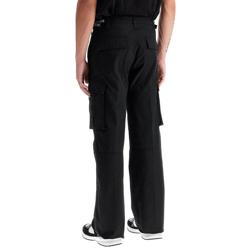 Pantalon cargo noir en coton de la marque Celine, coupe décontractée avec poches latérales visibles.