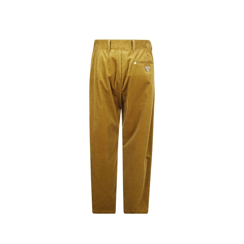 Pantalons décontractés bicolores en coton de Prada, coupe confortable et style moderne, visibles sur l'image.