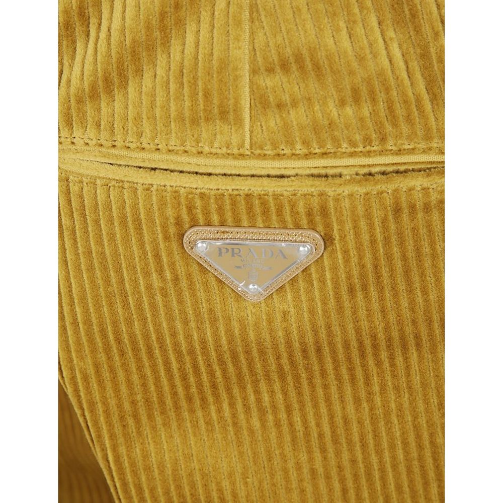 Pantalons décontractés en coton bicolore Prada, coupe élégante et moderne, visibles en image.