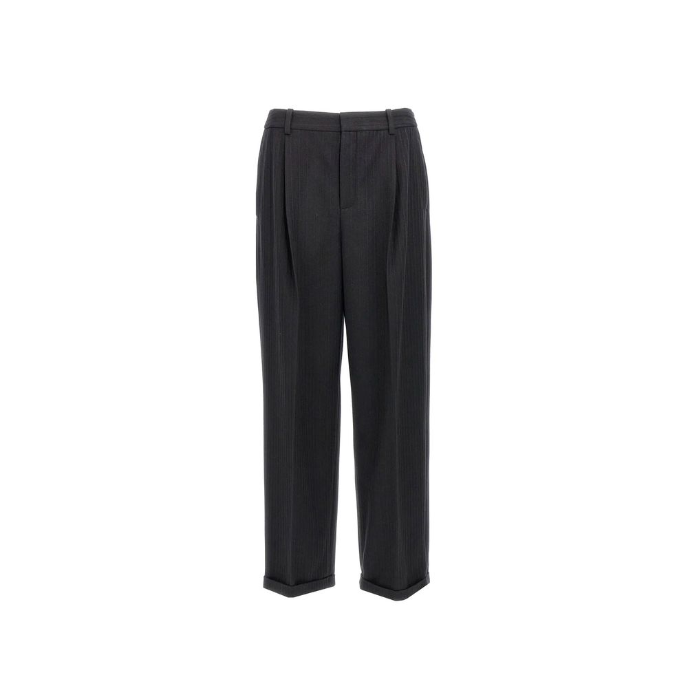 Pantalons décontractés en cachemire noir de Saint Laurent, coupe élégante et tissu doux visible sur l'image.