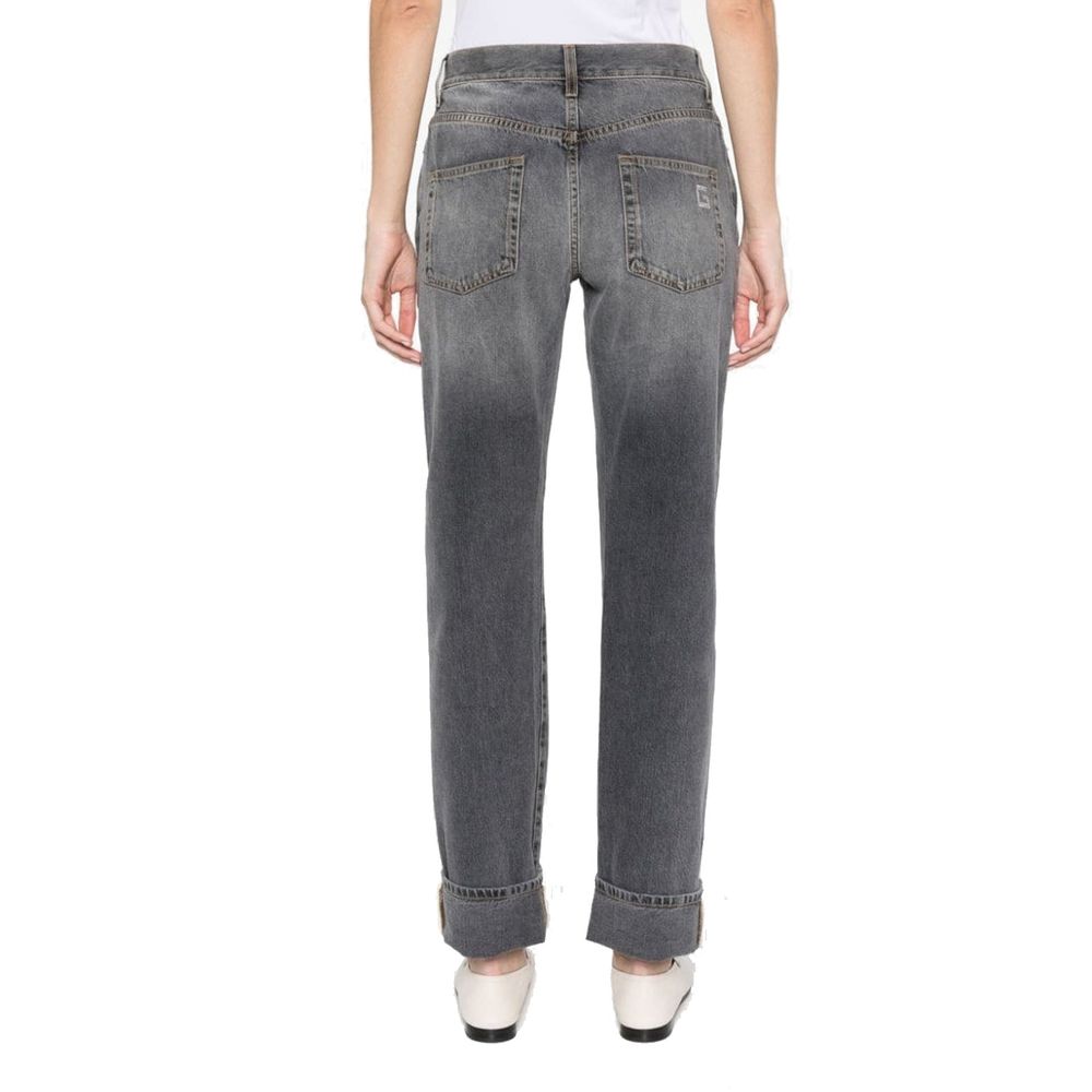 Jeans gris en coton de coupe décontractée de la marque Gucci, visibles avec détails et texture du tissu.
