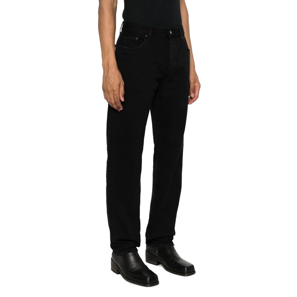 Jeans droit en coton noir de Saint Laurent, mode élégante et classique, visibles avec poches et couture précise.