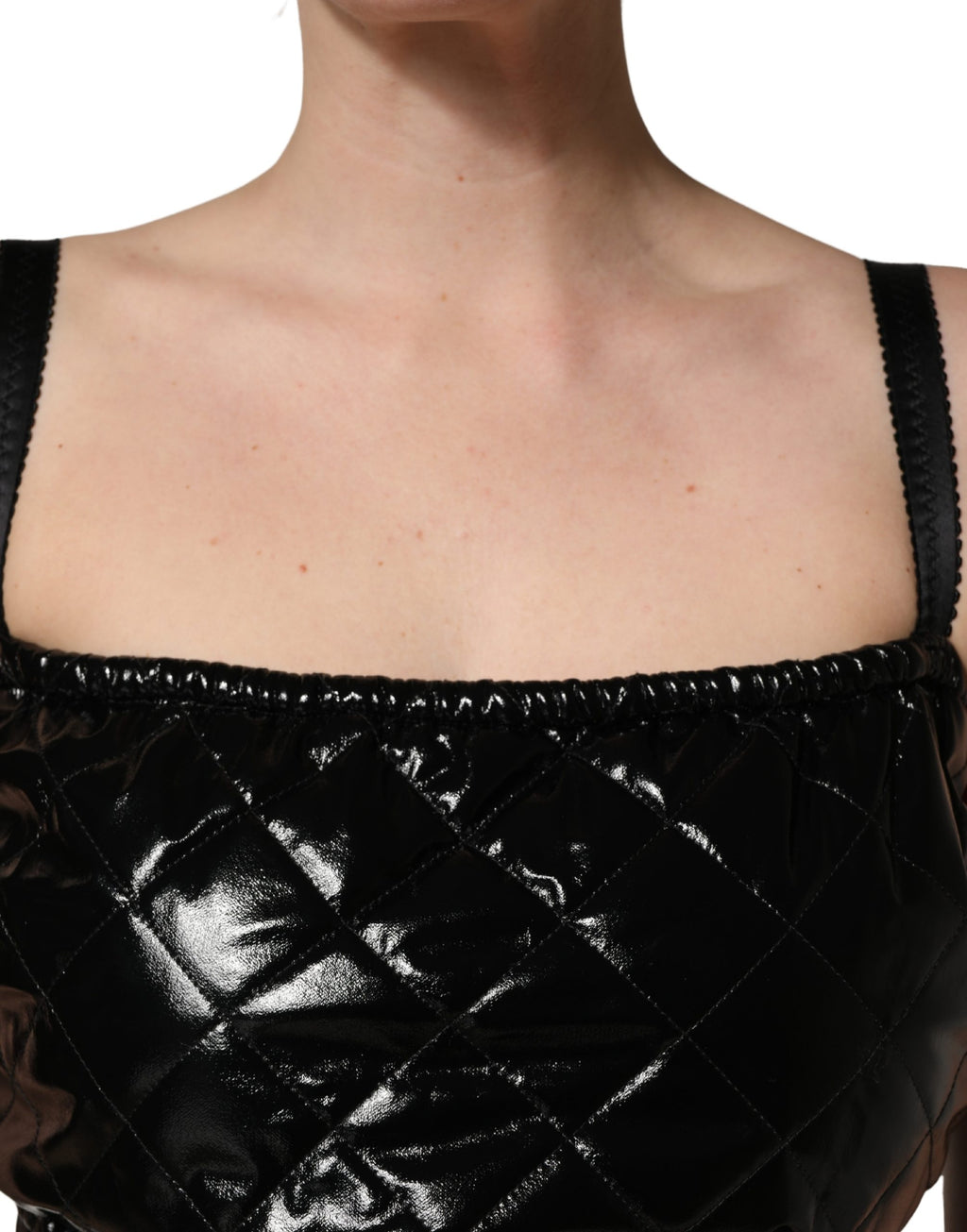 Combinaison sans manches noire Dolce & Gabbana, robe courte élégante pour femmes, en tissu fluide et moderne.