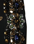 Robe sans manches noire Dolce & Gabbana avec motifs floraux, embellissements en perles et détails élégants.