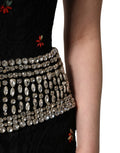 Robe courte noire Dolce & Gabbana en sequins ornés, coupe ajustée, élégante et brillante, pour une allure sophistiquée.