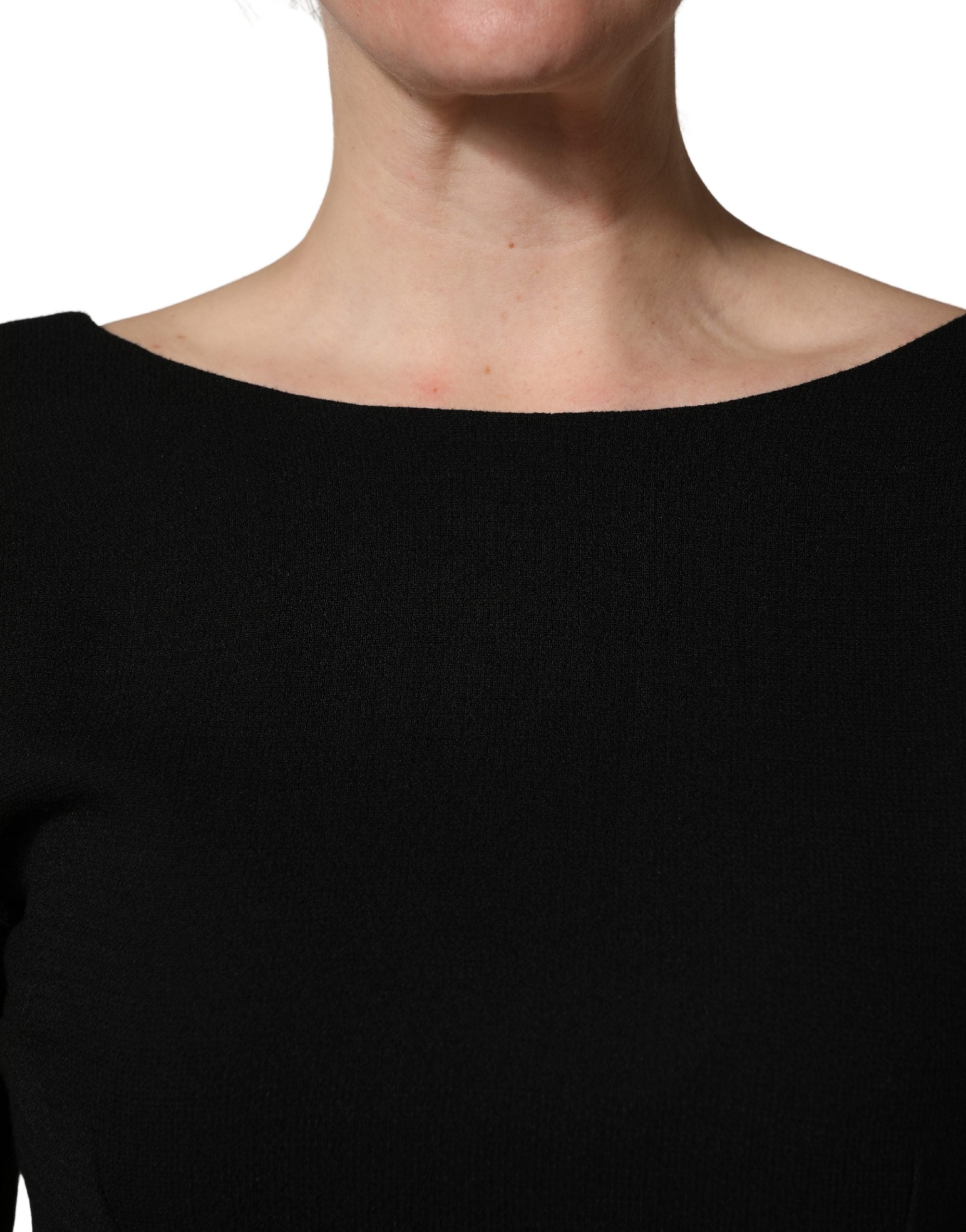 Robe midi en laine crépe noire Dolce & Gabbana avec manches longues, élégante et sophistiquée.