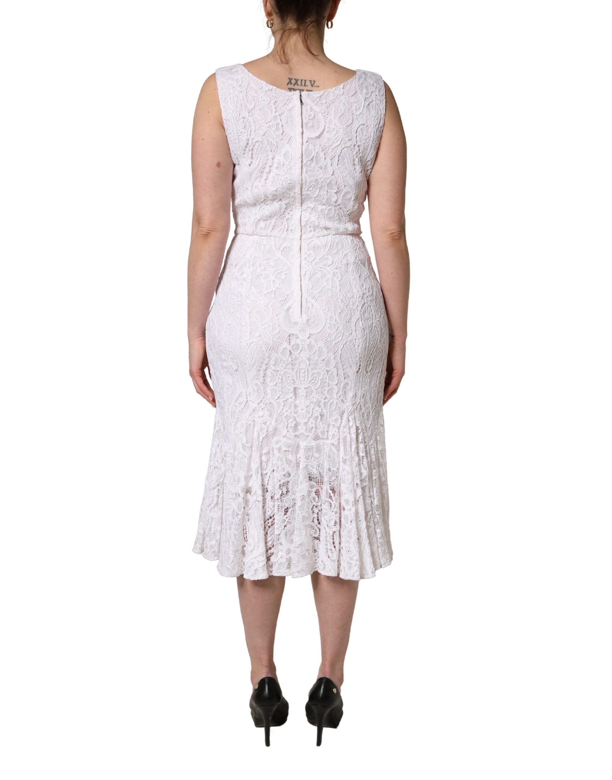 Robe midi sans manches Dolce & Gabbana en dentelle florale blanche, élégante et raffinée.