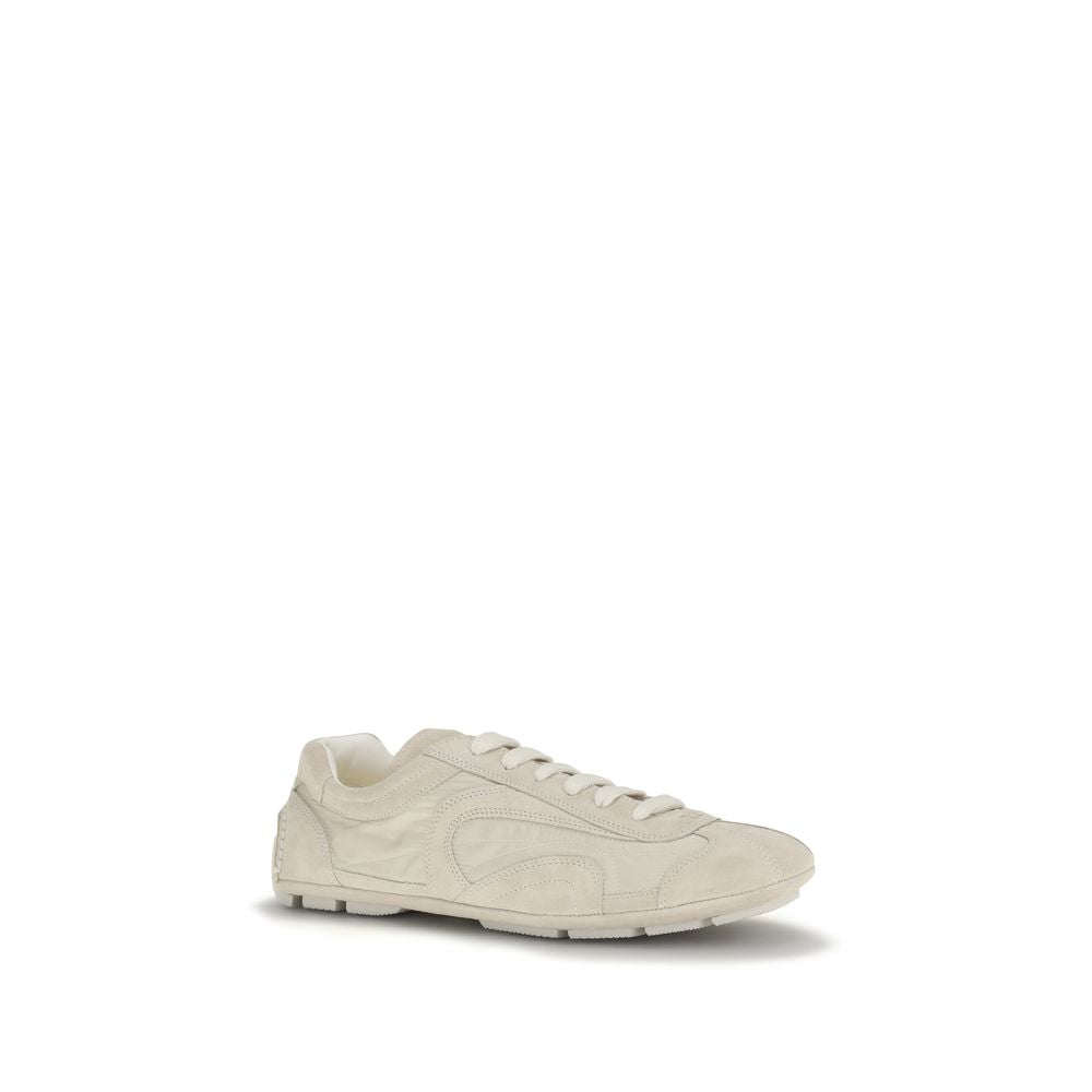 Chaussures Prada Bos Taurus en cuir de veau beige, baskets sportives élégantes avec semelle blanche.