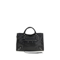 Sac à main Balenciaga en cuir d'agneau noir avec détails en or, vue de face, mettant en valeur le design élégant et la texture du cuir.