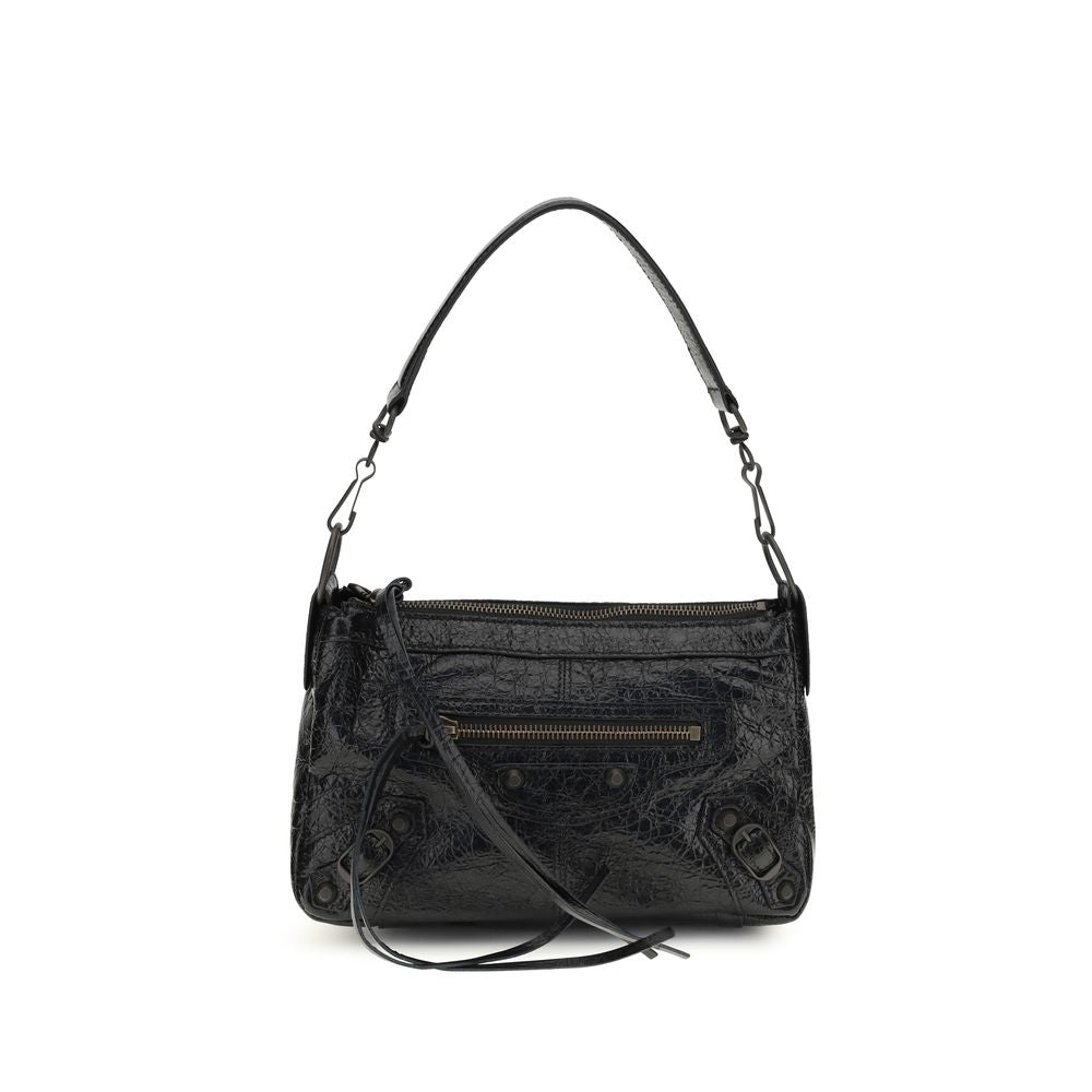 Sac à main Balenciaga en cuir de mouton noir, élégant et sophistiqué, avec détails de finition raffinés.