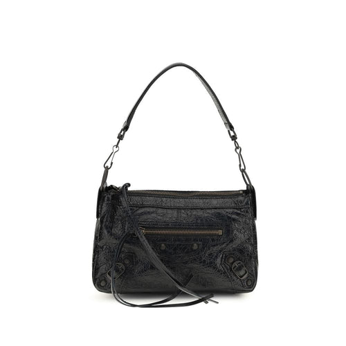 Sac à main Balenciaga en cuir de mouton noir, élégant et sophistiqué, avec détails de finition raffinés.