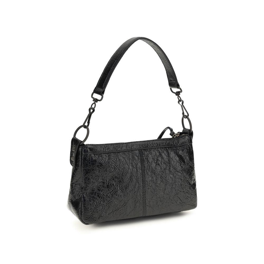 Sac à main Balenciaga noir en cuir d'agneau Ovis Aries, vue de face avec détails de la texture et des poignées en cuir.