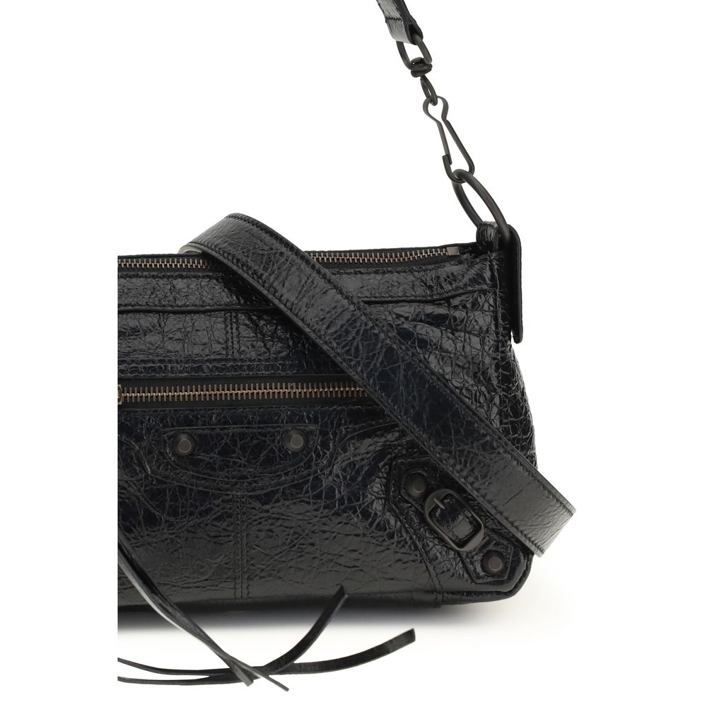 Sac à main Balenciaga en cuir d'agneau noir, modèle Ovis Aries, avec poignée élégante et finition soignée.