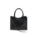 Sac à main Balenciaga en cuir d'agneau noir avec détails en ovis aries, élégant et sophistiqué.