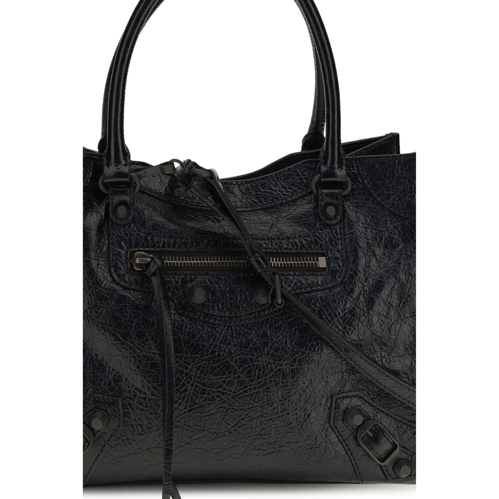 Sac à main Balenciaga en cuir d'agneau noir avec détails en ovis et Aries, style élégant et moderne.