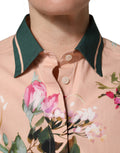 Chemise Dolce & Gabbana en coton rose avec fleurs, boutonnière frontale, style élégant et floral.