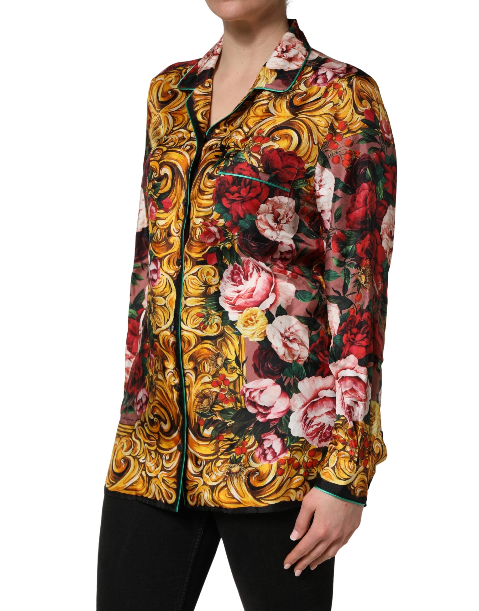 Chemise longue Dolce & Gabbana à fleurs multicolores à manches longues et boutons, tissu léger et élégant.