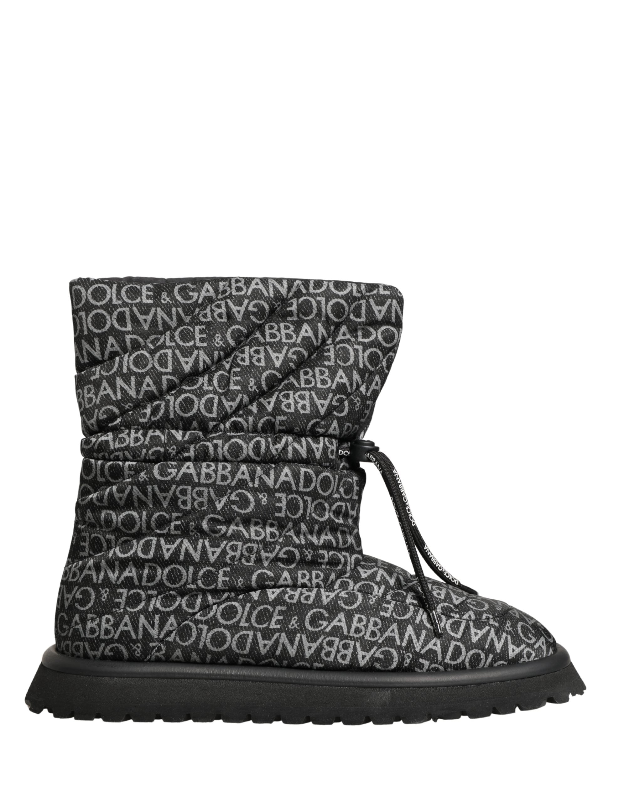 Bottes de neige noires Dolce & Gabbana avec logo imprimé en dentelle et lacets, hiver chaud et élégant