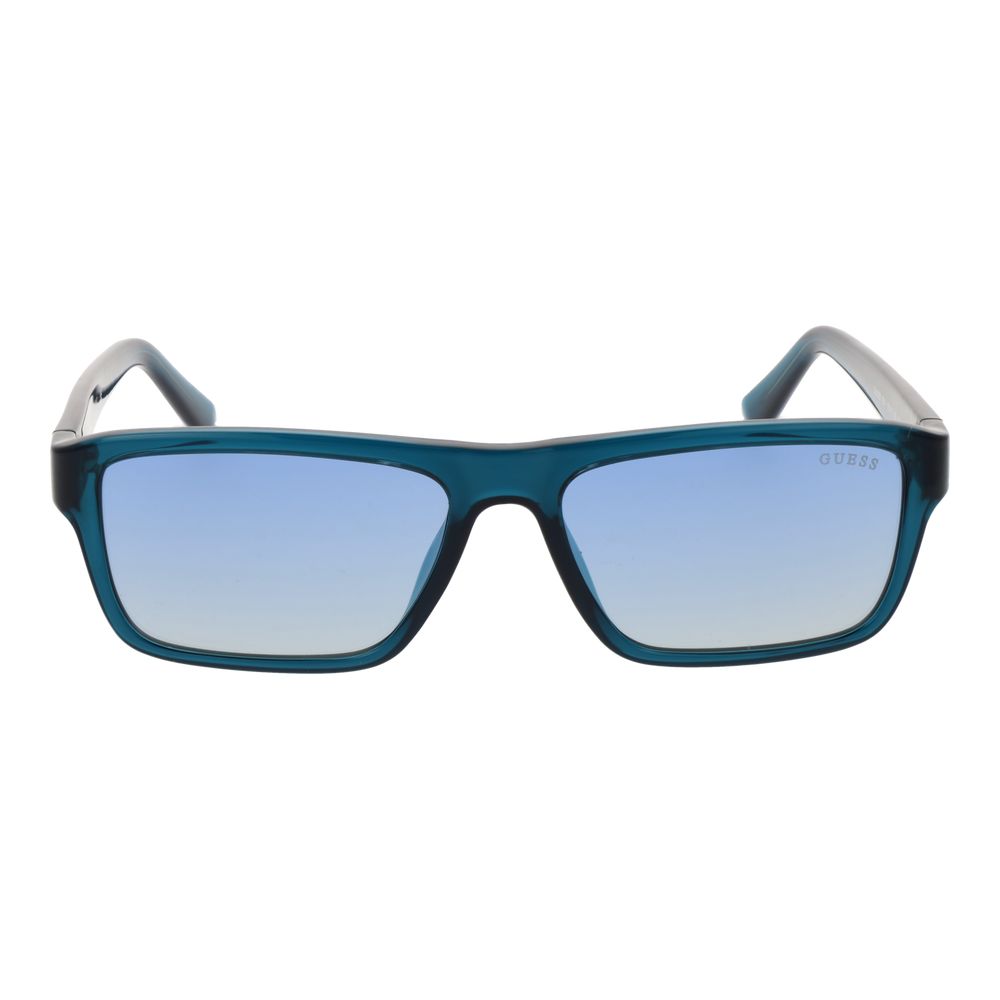 Lunettes de soleil en plastique bleues Guess, style tendance, monture rectangulaire avec verres teintés bleus.