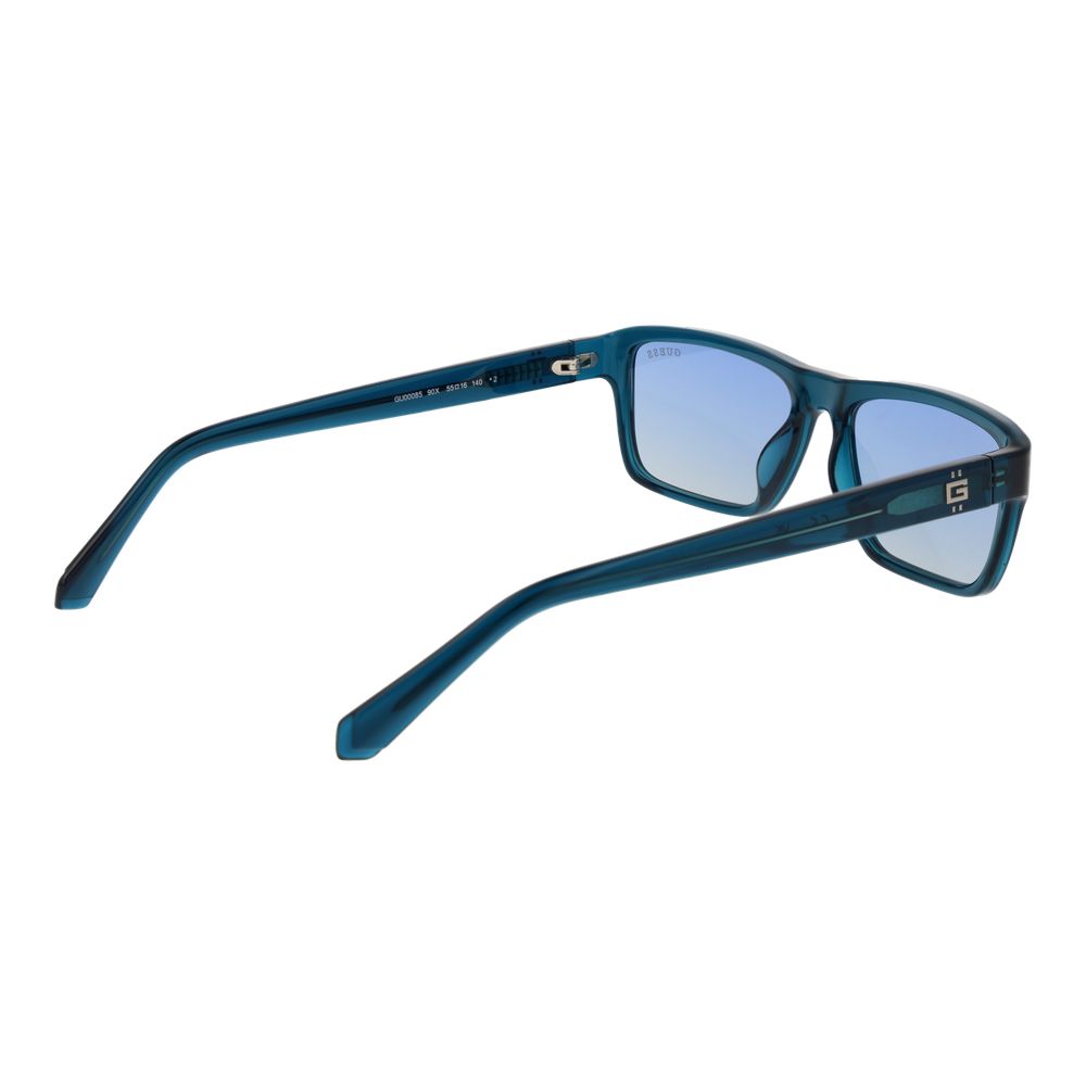 Lunettes de soleil en plastique bleues de marque Guess, avec monture tendance et verres ovales, mode et protection solaire.