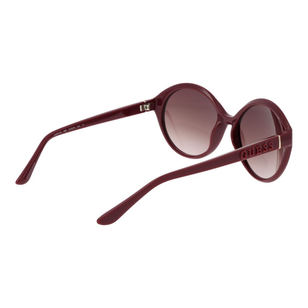 Lunettes de soleil en plastique violet Guess, style tendance avec monture colorée pour un look moderne et élégant.