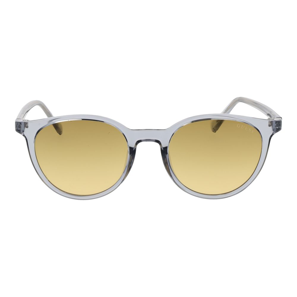 Lunettes de soleil Guess en plastique gris avec monture élégante et branches épaisses, style moderne et tendance.