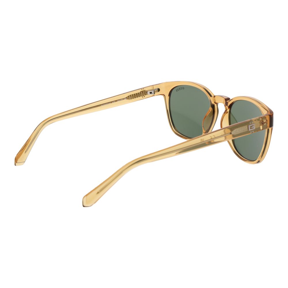 Lunettes de soleil Guess bicolores en plastique avec monture rectangulaire et verres teintés, style moderne et tendance.
