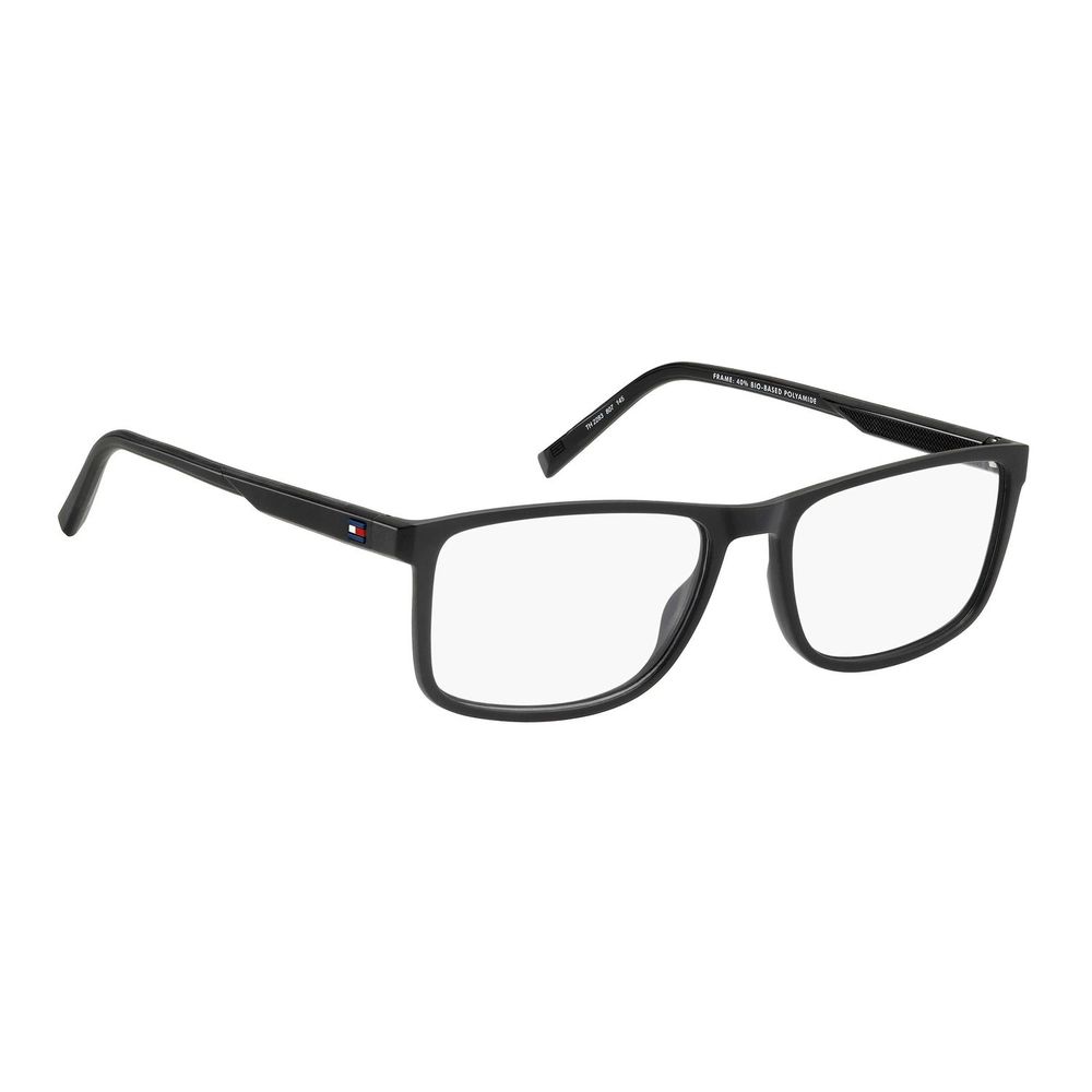 Lunettes Tommy Hilfiger en polyamide noire avec monture élégante et moderne, visibles en gros plan.