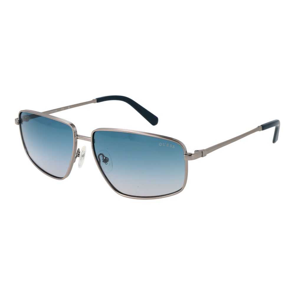 Lunettes de soleil en métal argenté Guess, style tendance, avec monture fine et verres foncés, pour un look élégant.