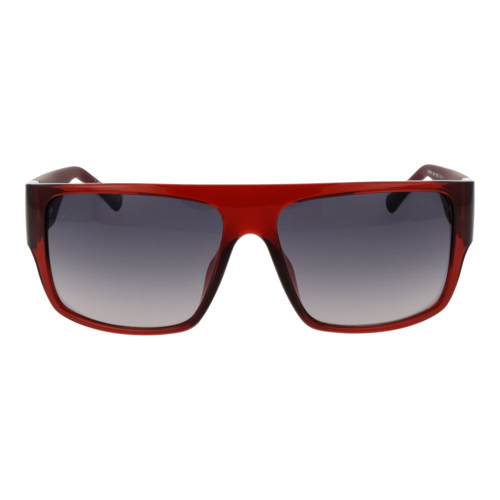 Lunettes de soleil en plastique multicolores de marque Guess, style tendance avec monture colorée et verres ovales.
