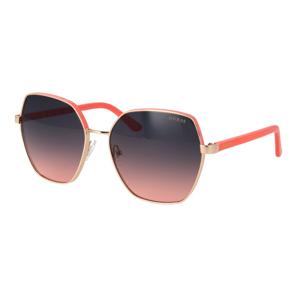 Lunettes de soleil en métal doré Guess, design élégant avec monture fine et verres foncés pour un style tendance et sophistiqué.