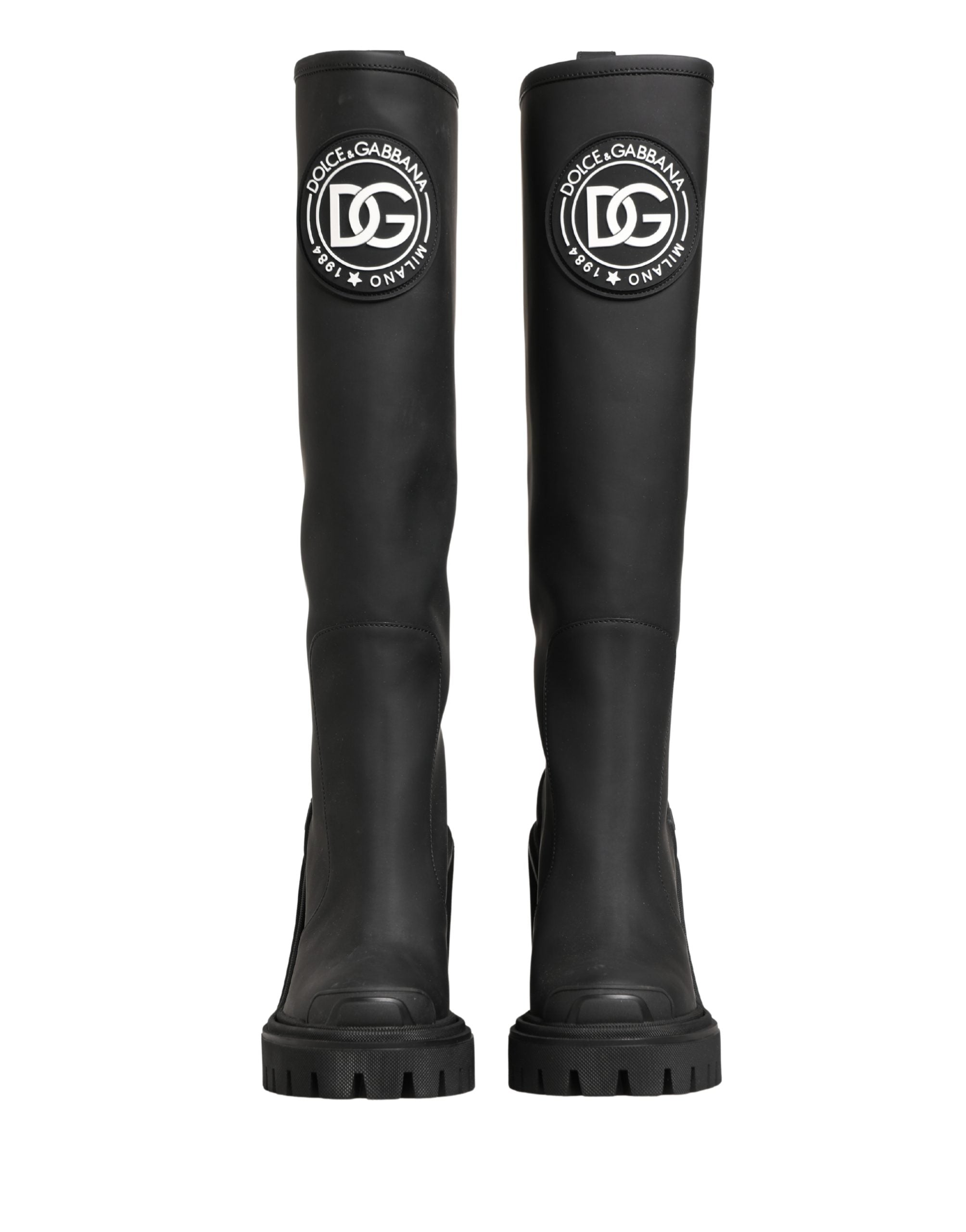 Bottes hautes en cuir caoutchouté noir de Dolce & Gabbana, chaussures élégantes en cuir noir avec finition brillant.