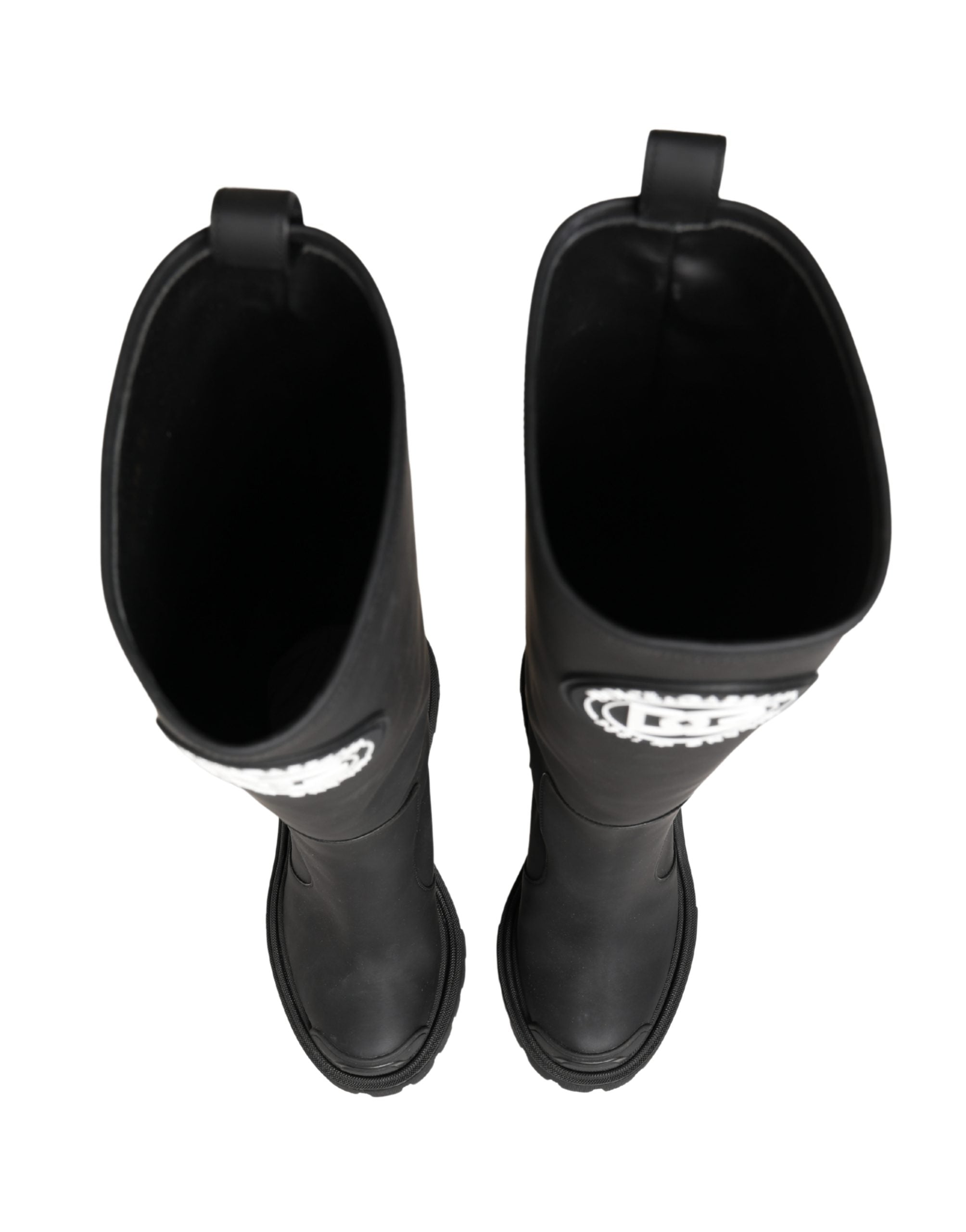Bottes hautes en cuir caoutchouté noir Dolce & Gabbana, style élégant avec finition brillante et semelle robuste.