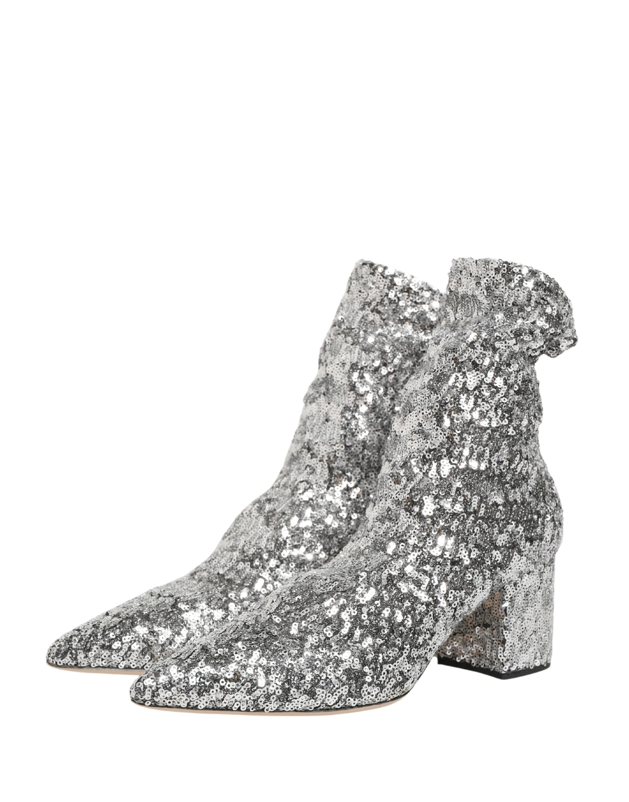 Bottes courtes argentées à sequins Dolce & Gabbana, chaussures extensibles avec finition brillante et style élégant.