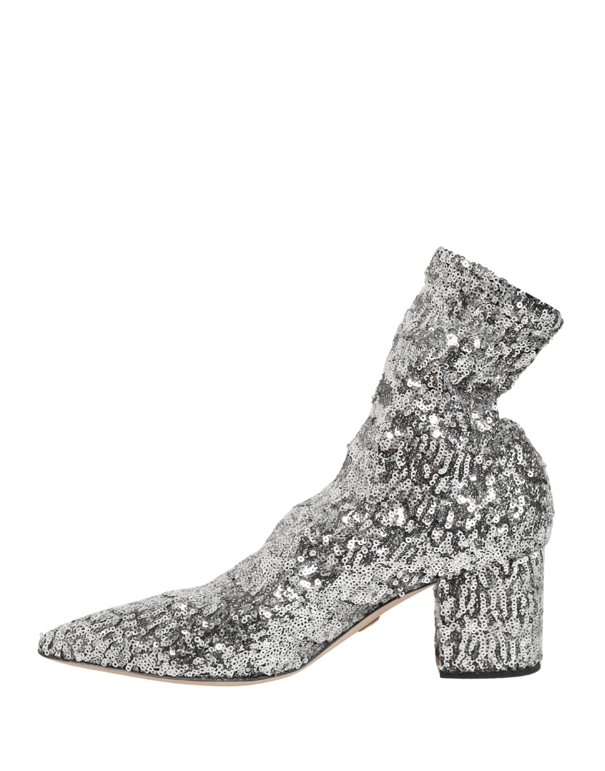 Chaussures courtes en sequins argentés de Dolce & Gabbana, bottines extensibles élégantes et brillantes.