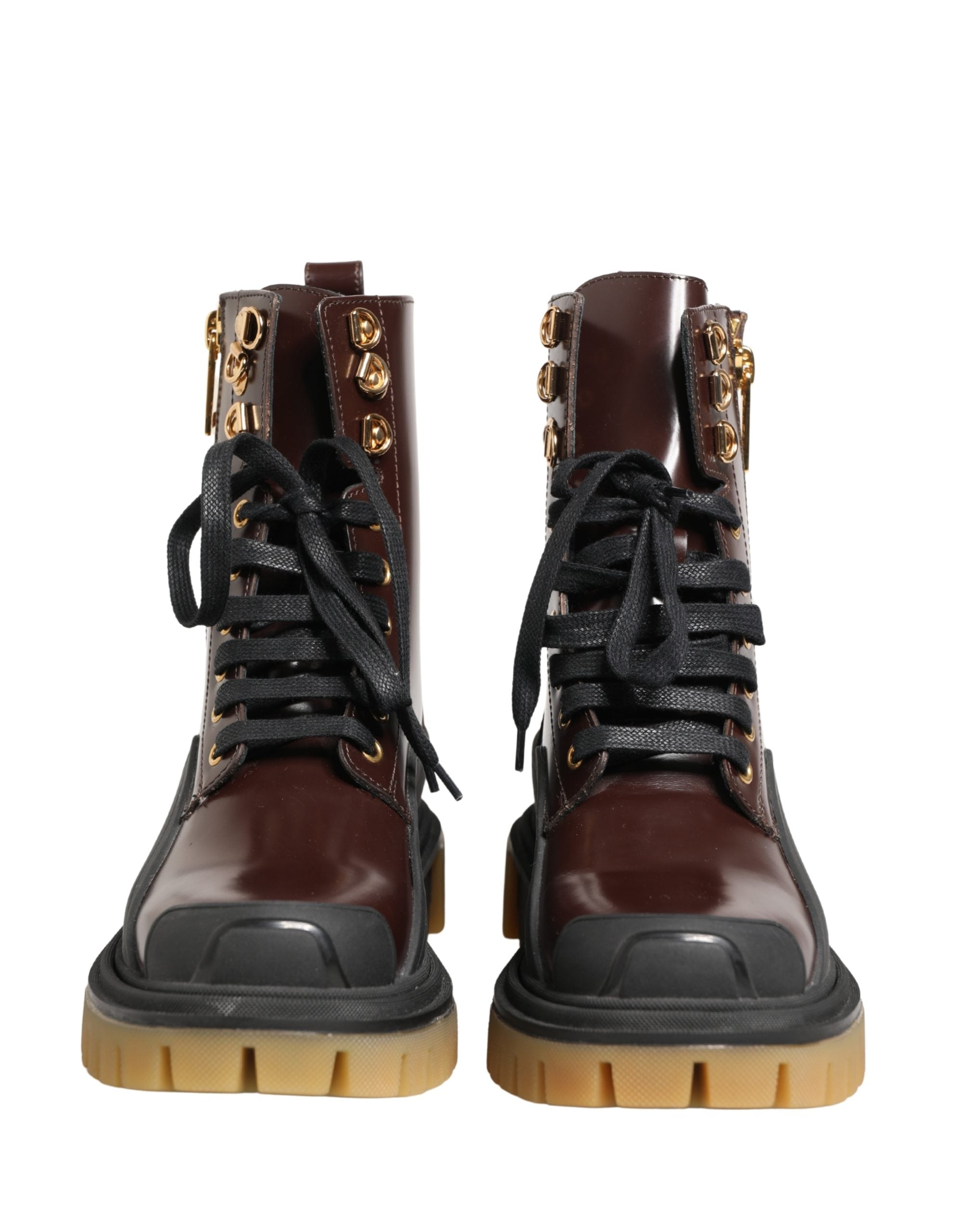 Bottes biker en cuir bordeaux de Dolce & Gabbana avec lacets, style robust et élégant, pour femmes ou hommes.