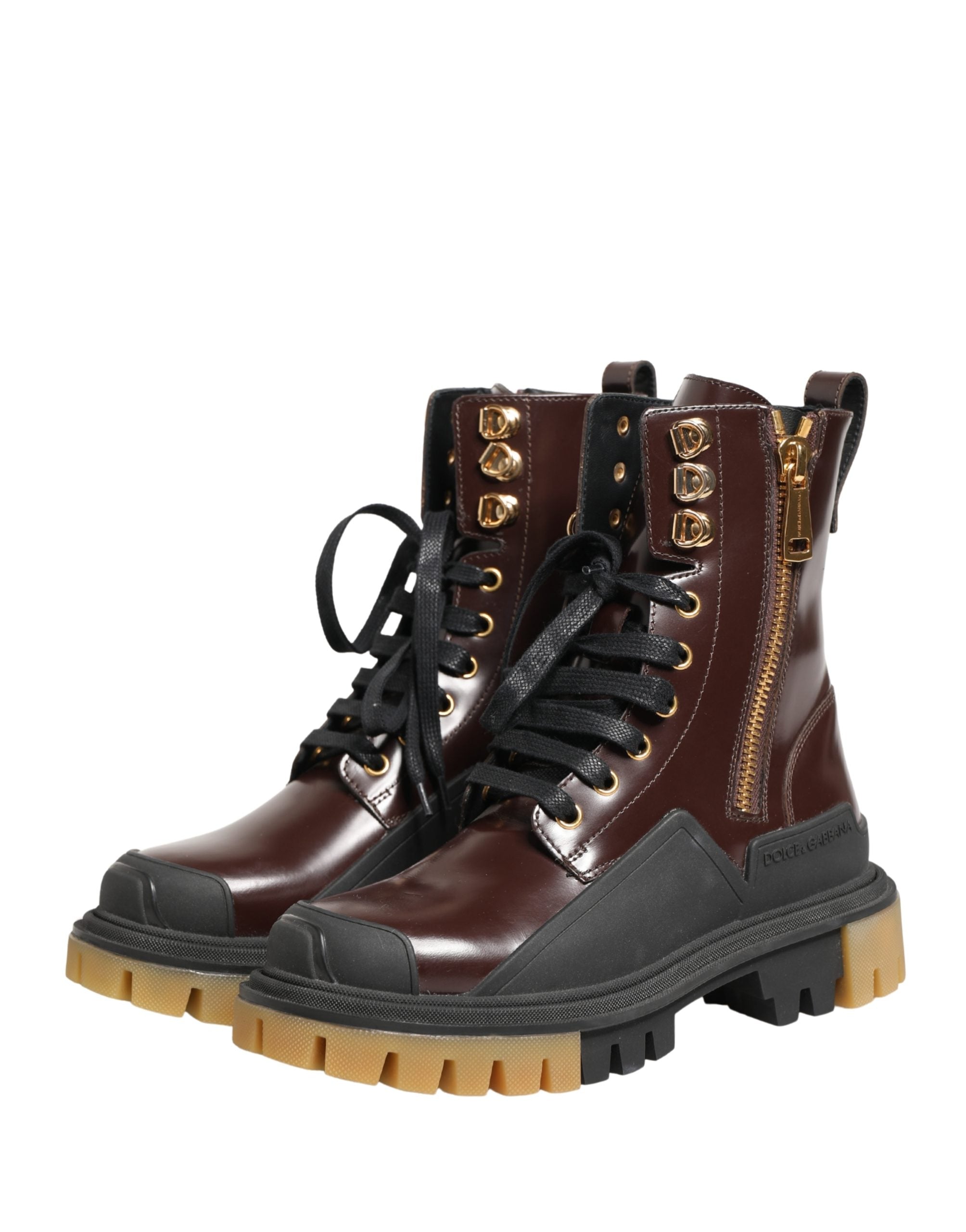 Bottes biker en cuir bordeaux de Dolce & Gabbana avec lacets, style robuste et élégant, pour femme ou homme.