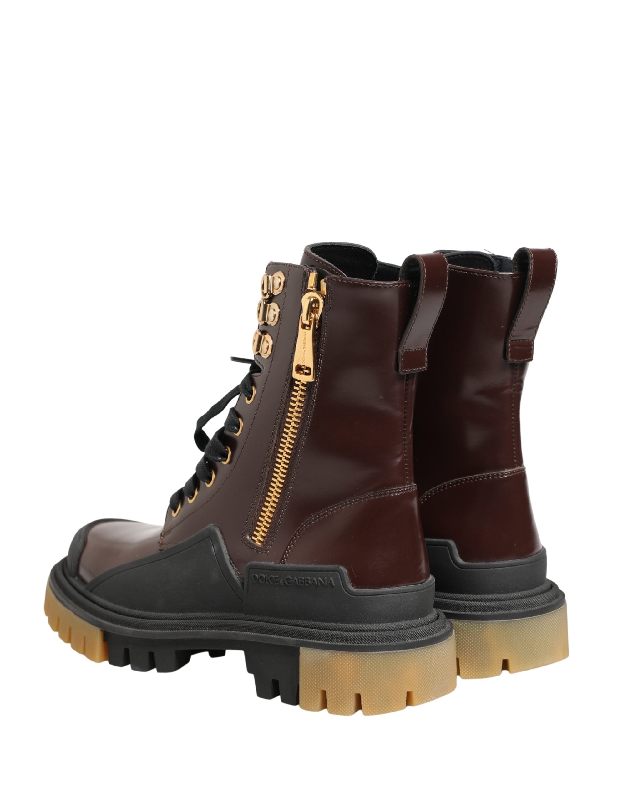 Bottes de moto en cuir bordeaux Dolce & Gabbana, à lacets, avec semelle robuste et design élégant.