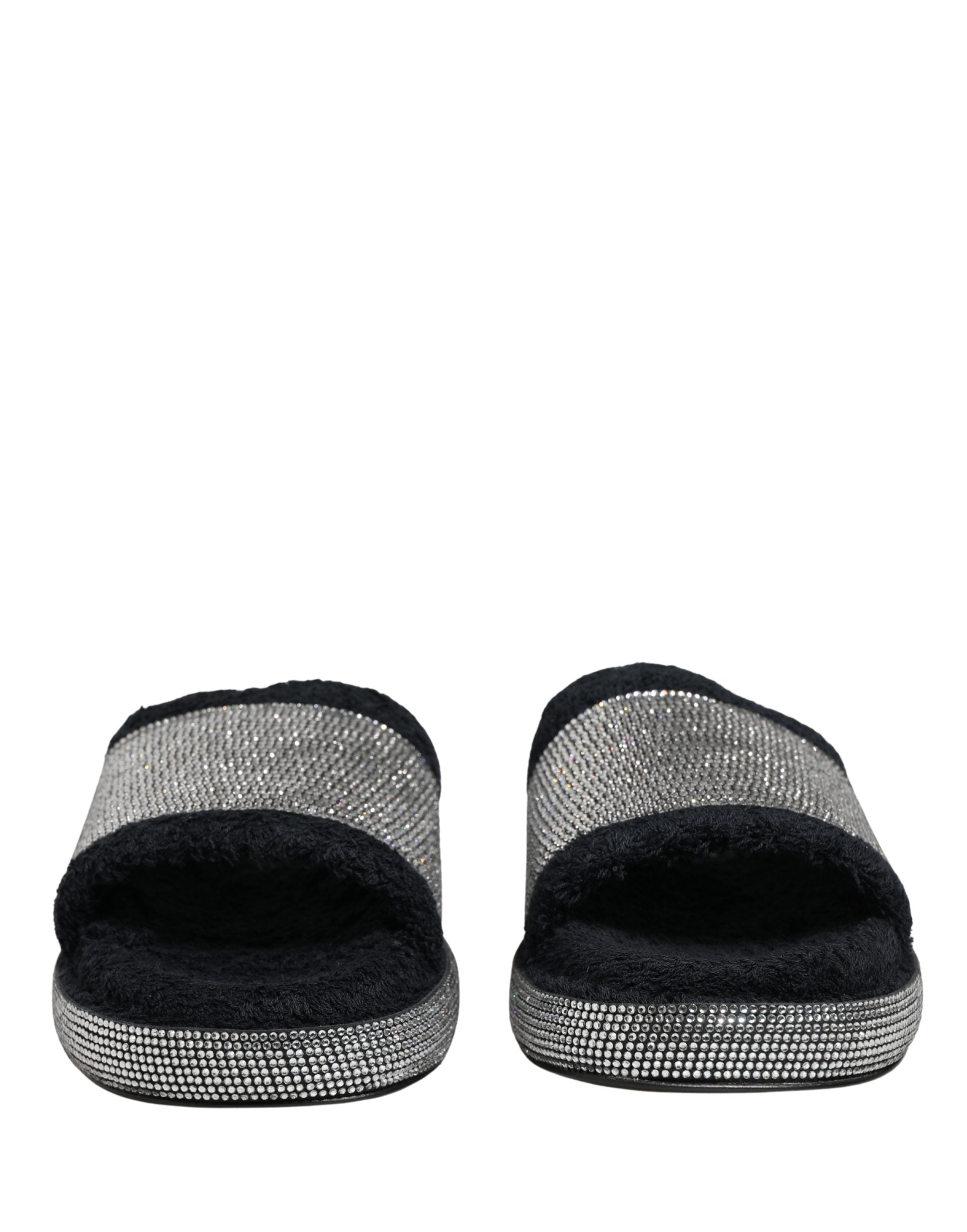 Sandales plates Dolce & Gabbana noires ornées de cristaux, chaussures à plateforme élégantes et glamour.