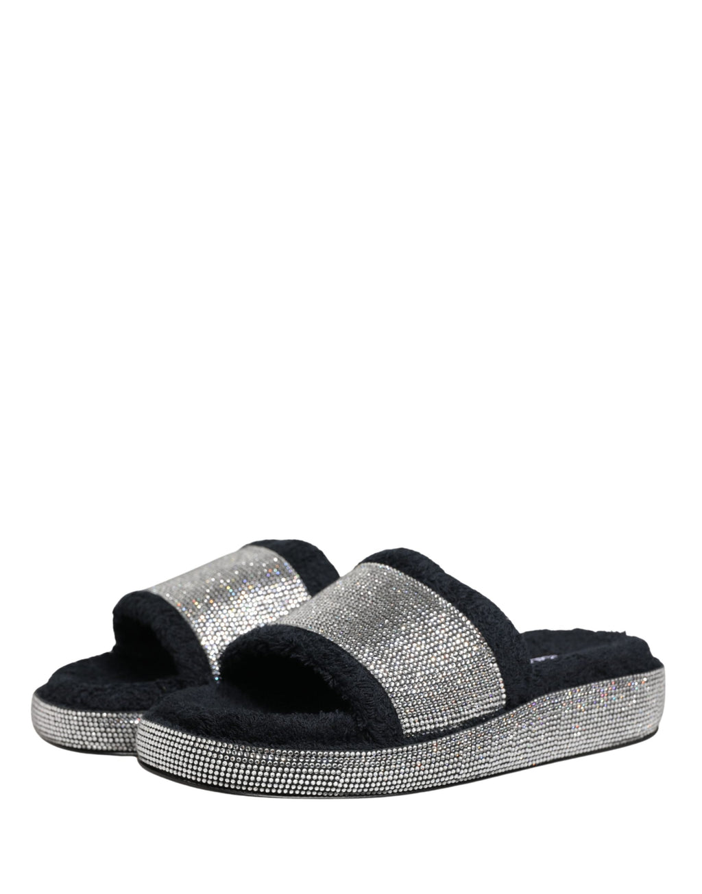 Sandales plateformes Dolce & Gabbana noires avec embellissements en cristal visibles sur la photo.