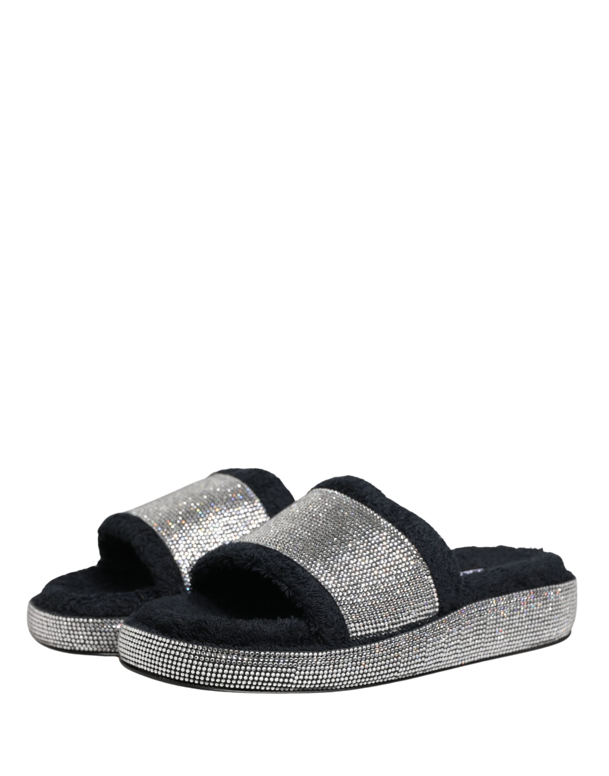 Sandales plateformes Dolce & Gabbana noires avec embellissements en cristal visibles sur la photo.