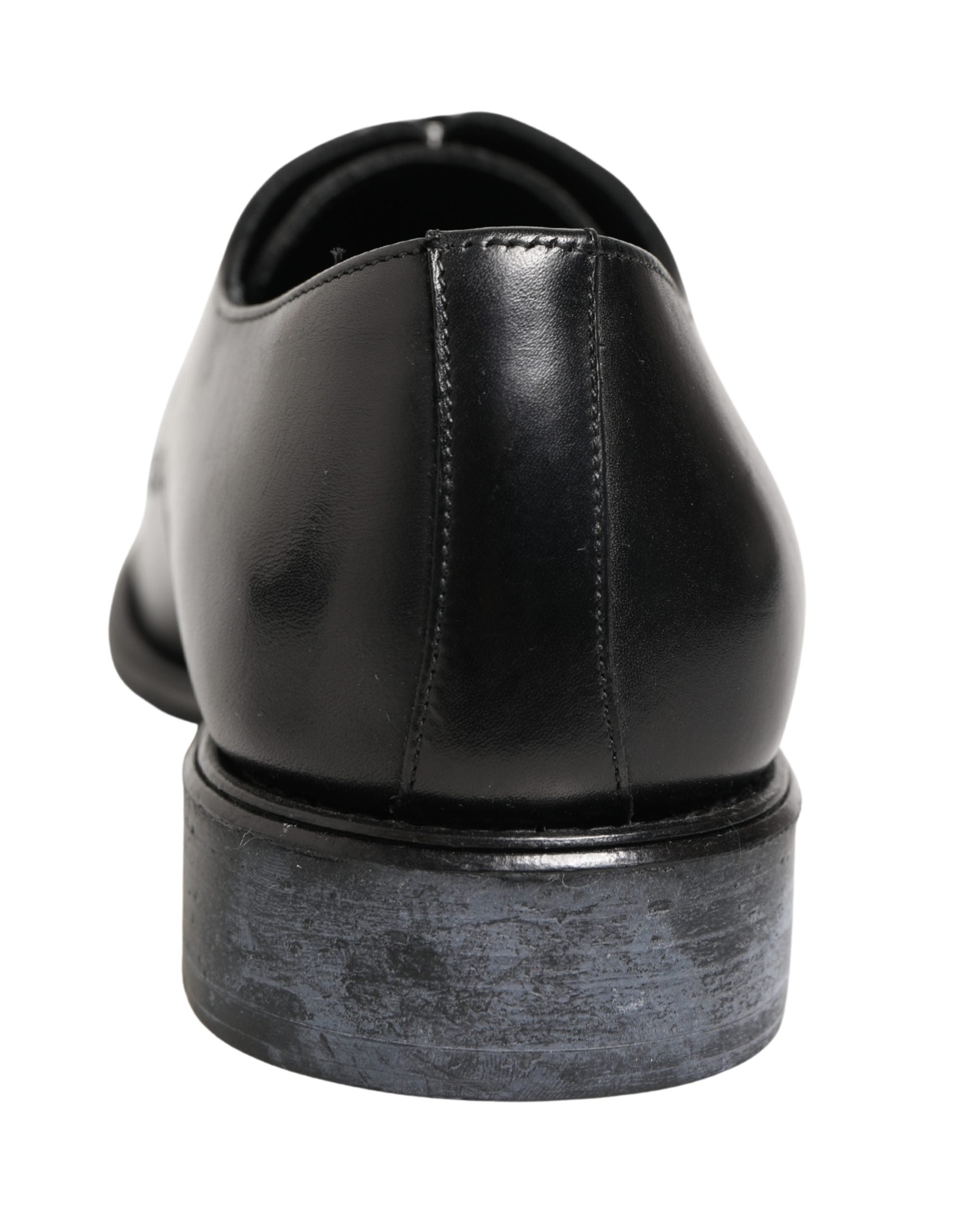 Chaussures Derby en cuir de veau noir de Dolce & Gabbana pour homme, élégantes et sophistiquées.
