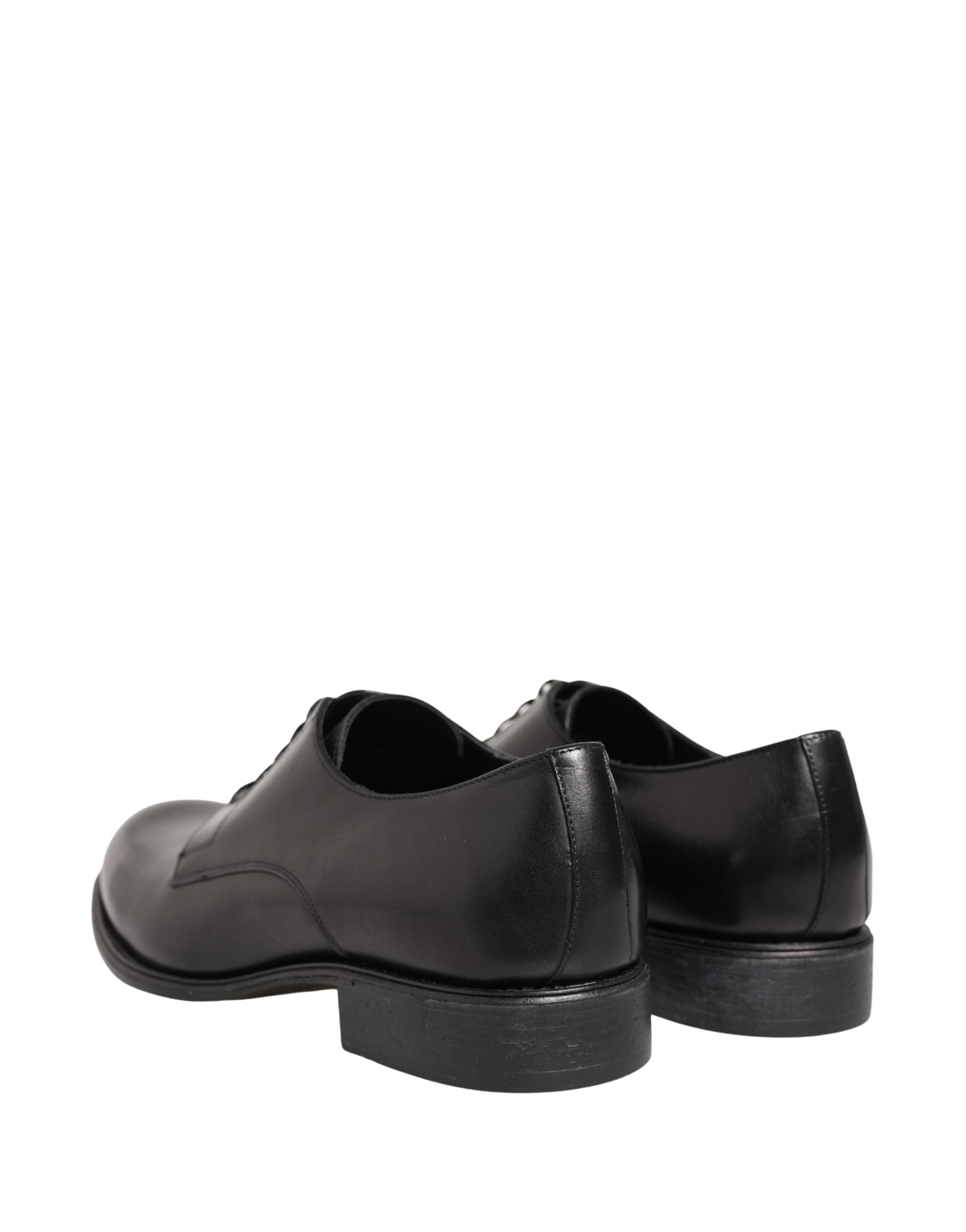 Chaussures Derby en cuir de veau noir de Dolce & Gabbana pour homme, élégantes et classiques, visibles en image.