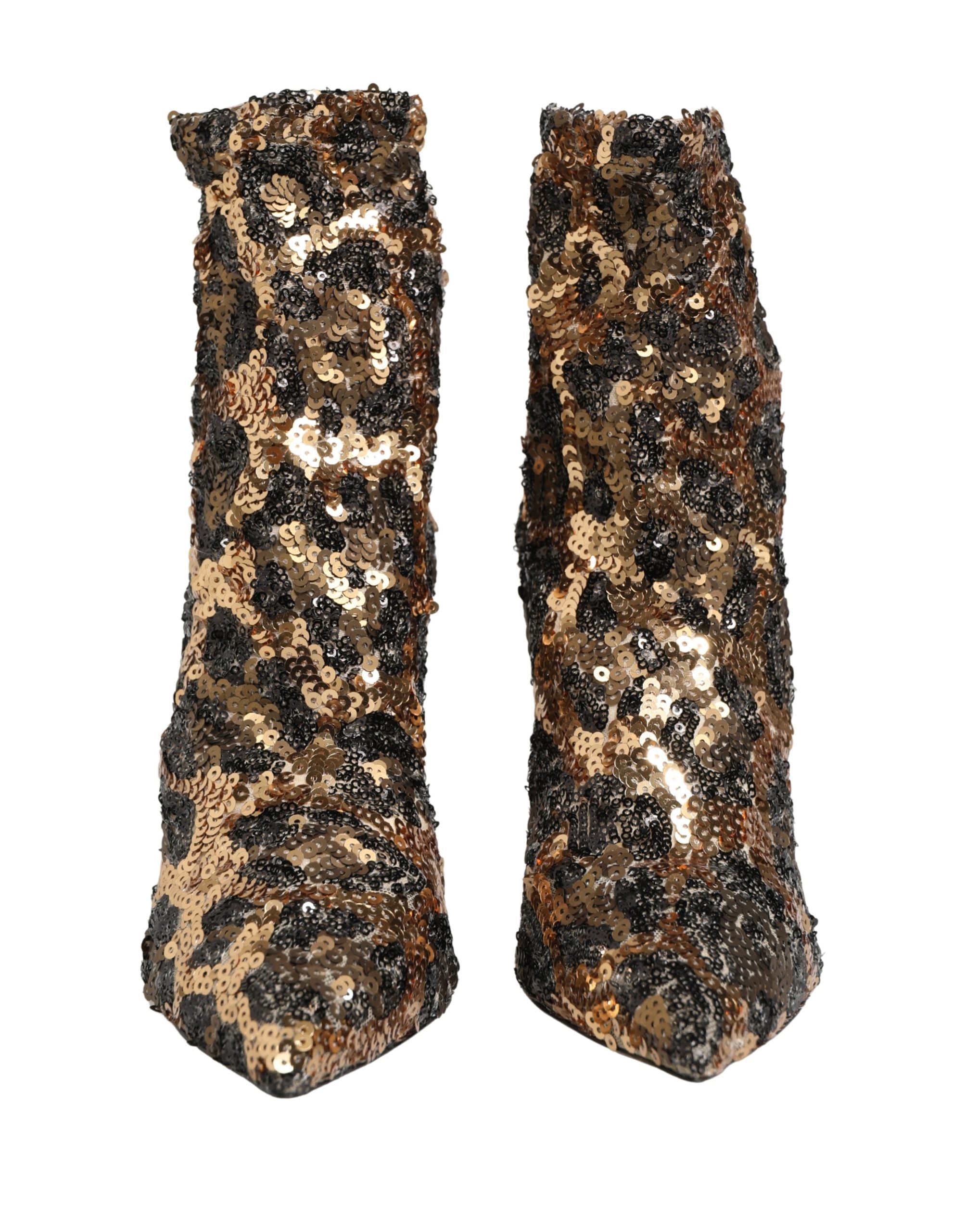 Bottines à talons Dolce & Gabbana en sequins dorés à motif léopard, bout arrondi et semelle en cuir.