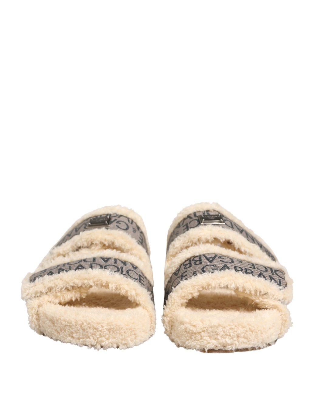 Chaussures Dolce & Gabbana, sandales plates en fausse fourrure beige avec logo imprimé, style élégant et confortable.
