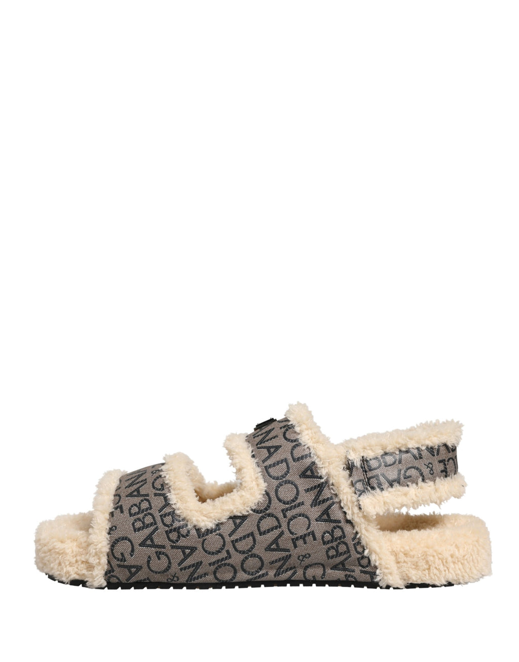 Sandales plates Dolce & Gabbana en fausse fourrure beige avec logo imprimé, chaussures élégantes et confortables.