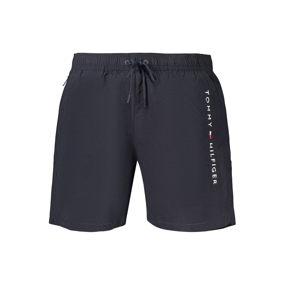 Shorts pour homme Tommy Hilfiger en polyester bleu, avec ceinture et poches, parfaits pour un style décontracté.