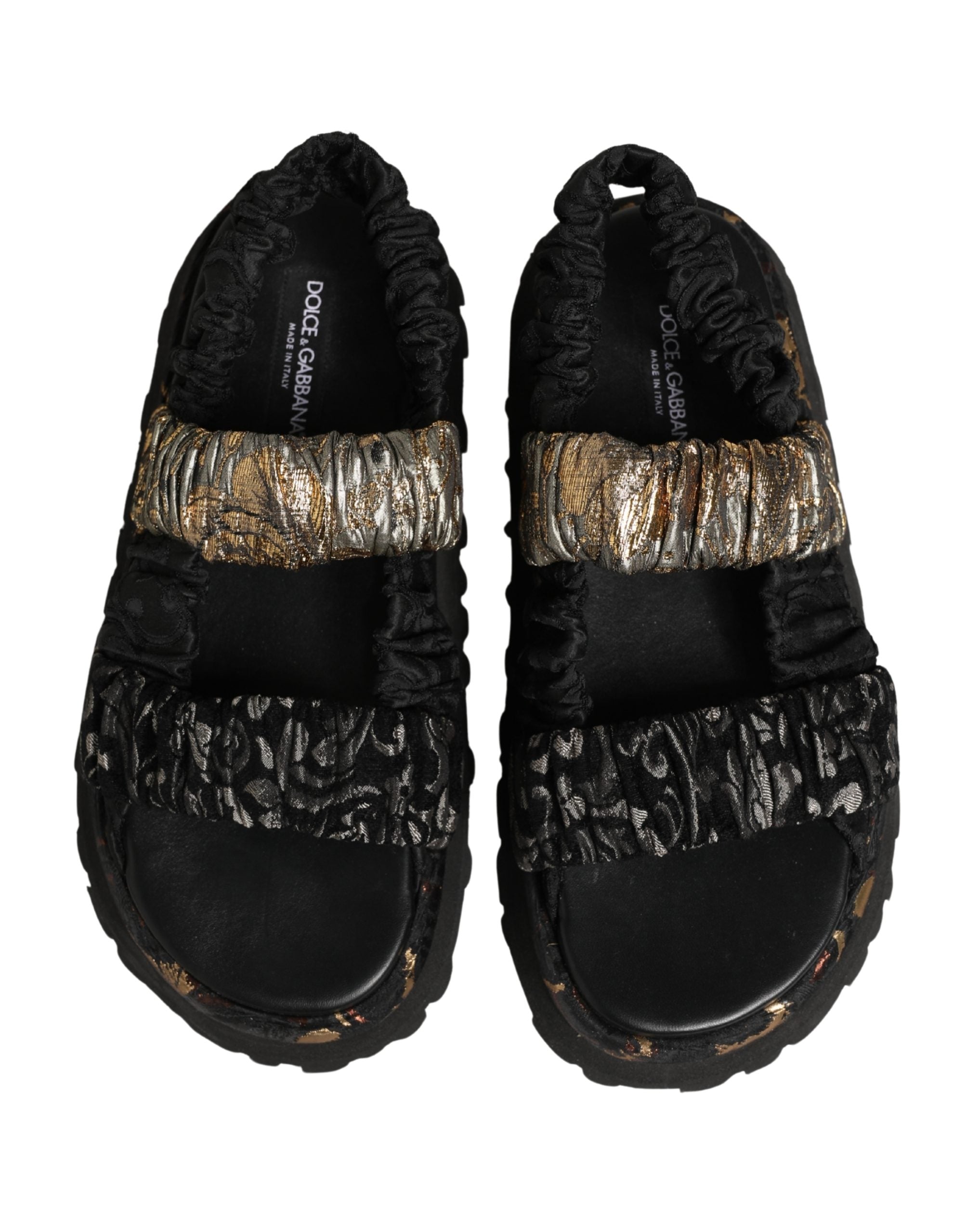 Sandales pour hommes Dolce & Gabbana noires avec détails froncés et semelles plates, chaussures élégantes en cuir.